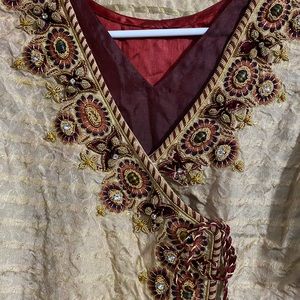 2 piece Maroon and golden embroidered jamawar shirt and dupata.